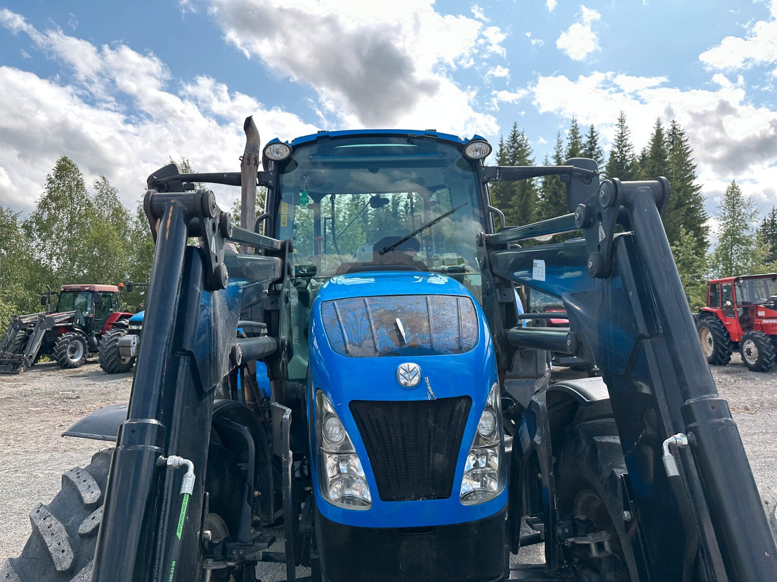bc31aa49-f623-439a-b7d0-375a356f64bc new holland t5.115 – 115ch – 2 230 h – 2013